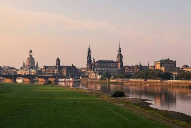 Dresden old town skyline across the Elbe at dusk